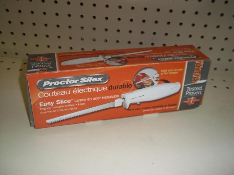 lot 30 image: New Procter Silex Electric Knife...