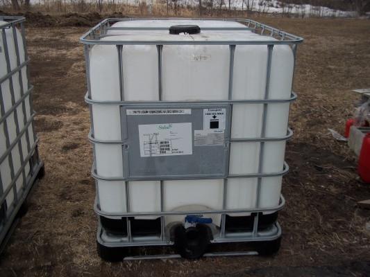 lot 5 image: 330 Gallon Polly tank with Pallet a...
