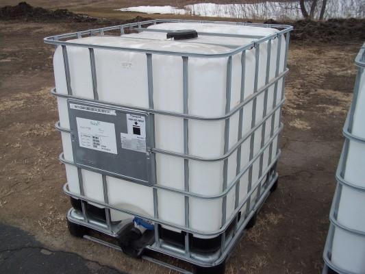 lot 9 image: 330 Gallon Polly tank with Pallet a...
