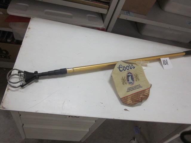 Golf ball fetcher in Coors bag....