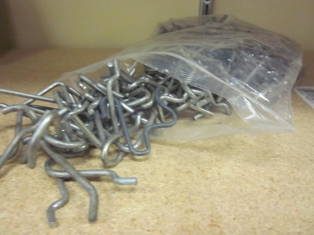 Bag of metal peg board clips and ha...