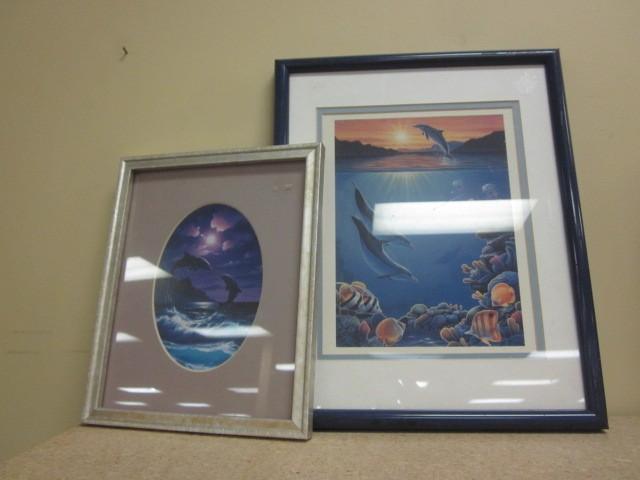 Pair of dolphin framed wall prints....