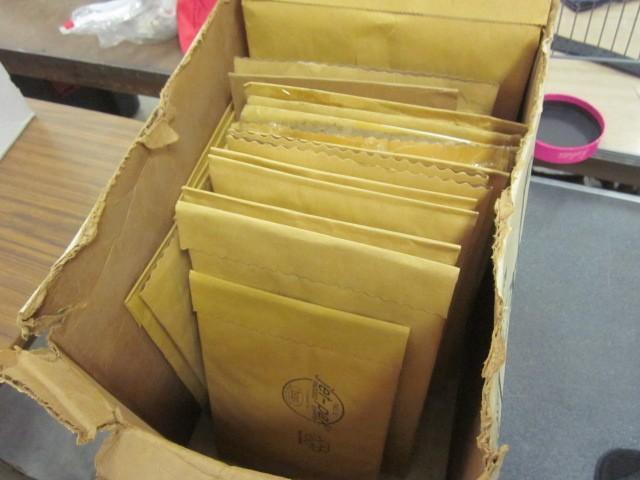 Box of soft sided shipping envelope...