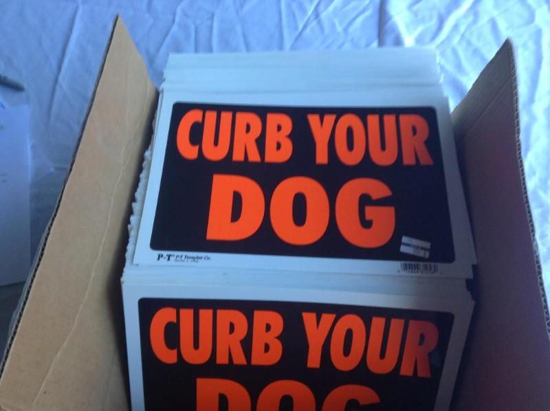 lot 102 image: New Curb Your Dog signs, count appr...