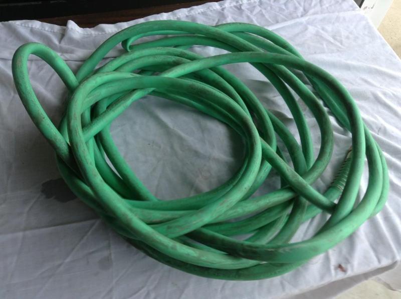 lot 115 image: Green Garden hose, standard sizega...