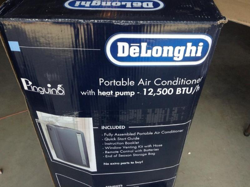 lot 31 image: Air Conditioner by Delonghi, runs f...