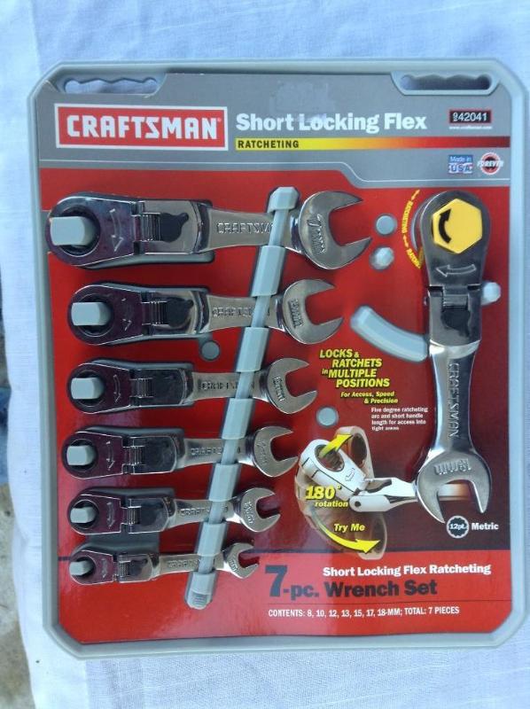 lot 97 image: New 7 piece Metric 180 degree rotat...