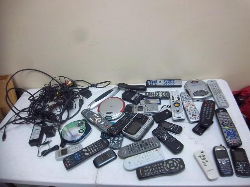lot 85 image: Lot Of Remotes, Wires And Other Ele...