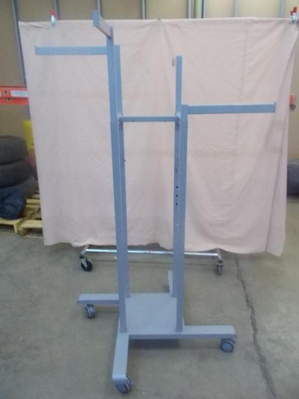 Adjustable arm display rack. Rollin...
