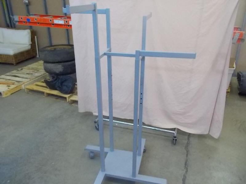 Adjustable arm display rack. Rollin...