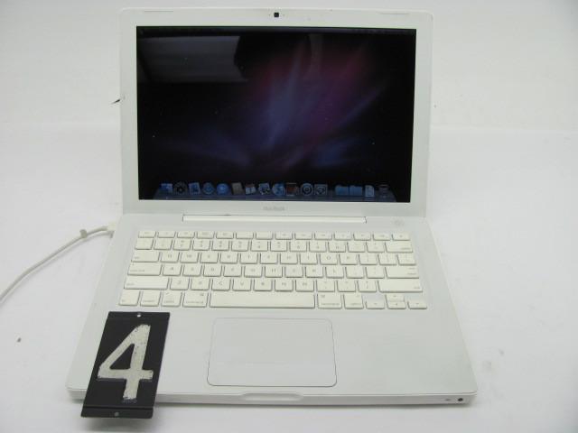 lot 4 image: Apple macbook A1181 laptop computer...