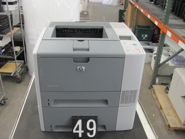 lot 49 image: HP laserjet 2420d printer. This uni...