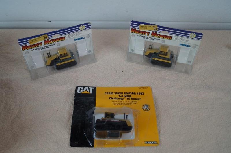3 collectable Cat tractor replicas...