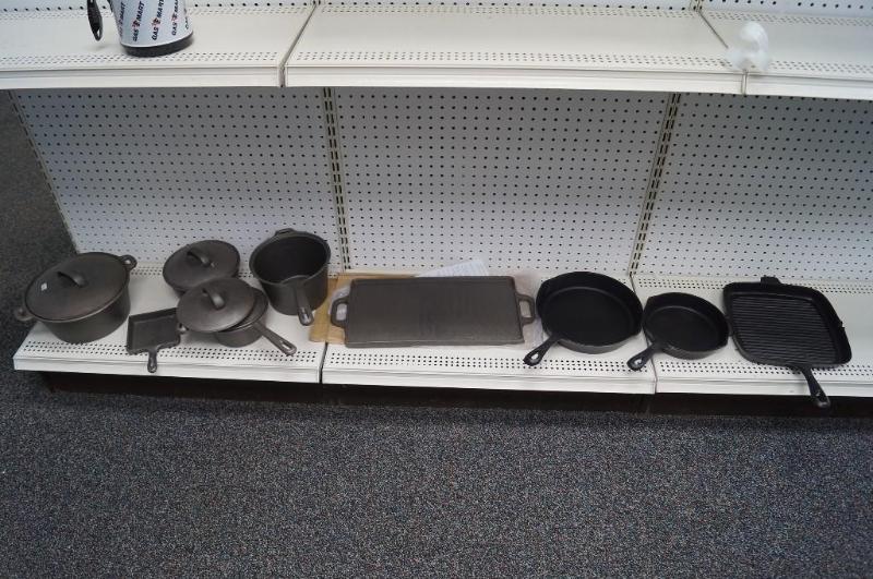 lot 31 image: 9 piece cast iron skillet and pots...