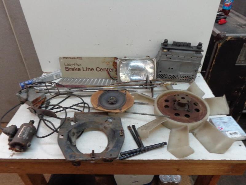 lot 130 image: Cooler Full of Car Parts Head Light...