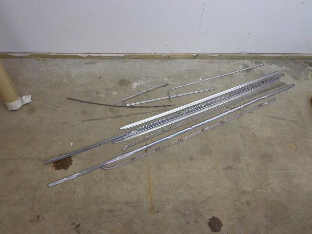 lot 175 image: Aluminum Car Trim Looks like Door T...