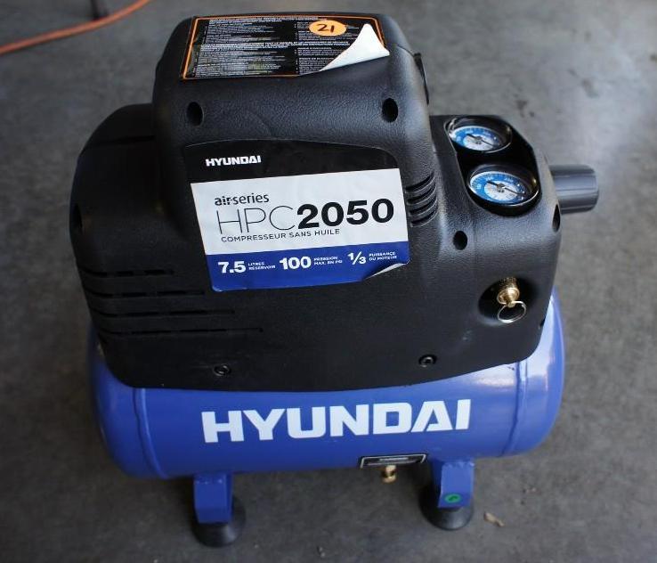 lot 21 image: Hyundai air compressor Model #HPC20...