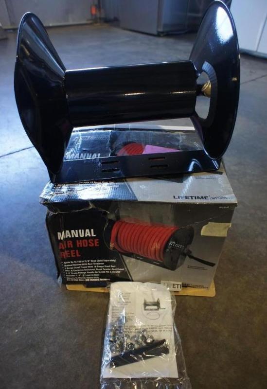lot 26 image: Manual Air Hose Reel. Dented on one...