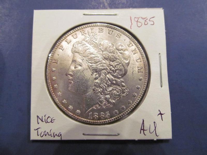 1885 Morgan Silver Dollar Grade AU...
