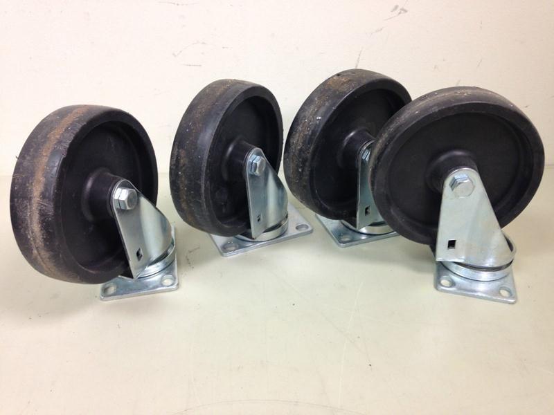 Lot of (4) Steel Swivel Plate Caste...