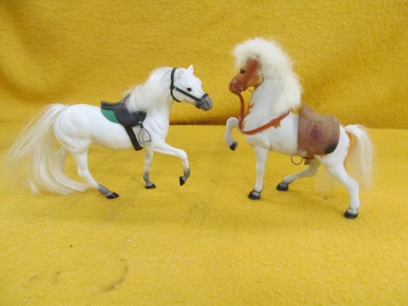 2 White Horses with Saddles...