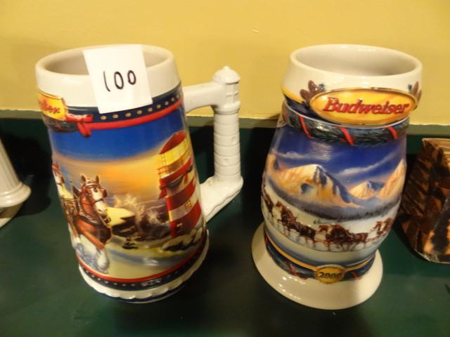 2 Budweiser holiday steins. 2002 an...