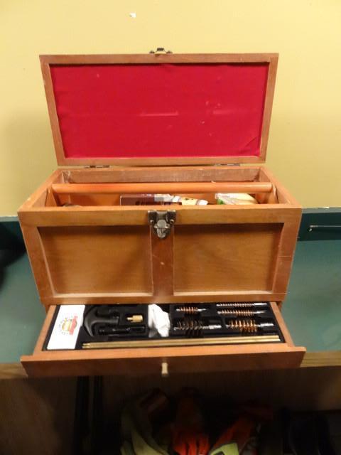 Wood box with gun cleaning kit insi...
