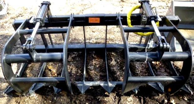 lot 15 image: Universal Mount Bobcat Skid Loader ...