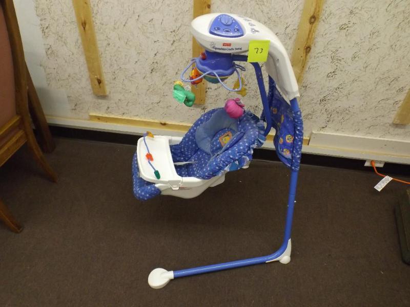 lot 73 image: Fisher Price Aquarium cradle swing....