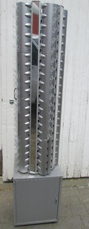 Sun glasses spinner with storage co...