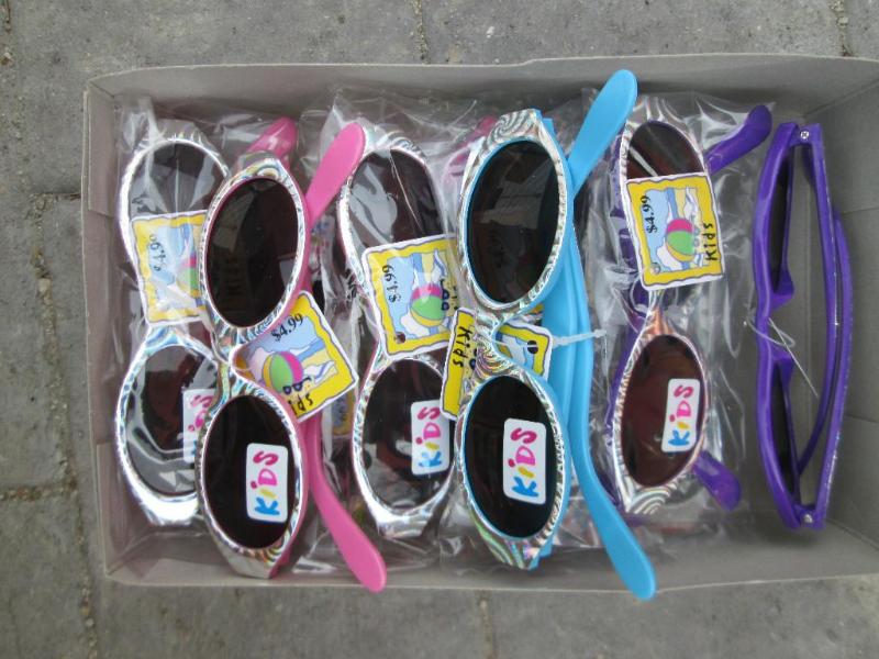 Box of 12 sunglasses, MSRP $4.99 EA...