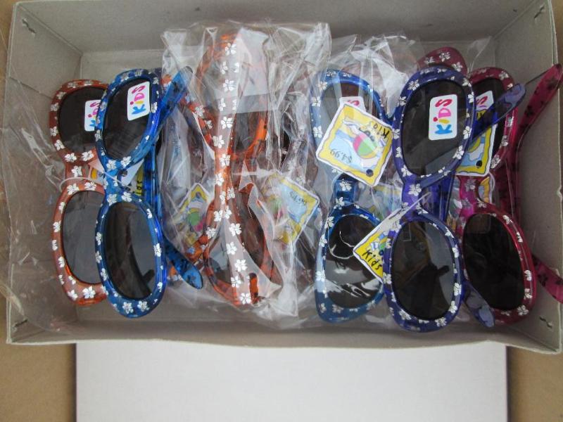 Box of 12 sunglasses, MSRP $4.99 EA...