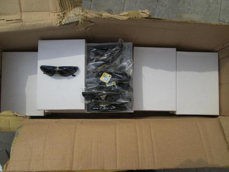 Lot of 11 boxes, 12 per box, sungla...