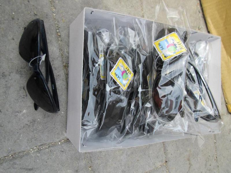 Box of 12 sunglasses, MSRP $4.99 EA...
