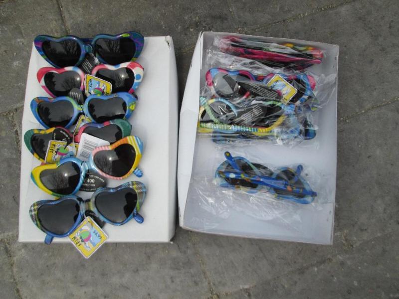 Box of 12 sunglasses, MSRP $4.99 EA...