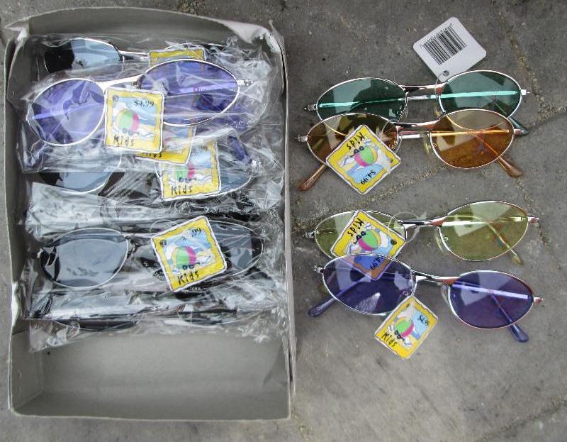 Box of 12 sunglasses, MSRP $4.99 EA...