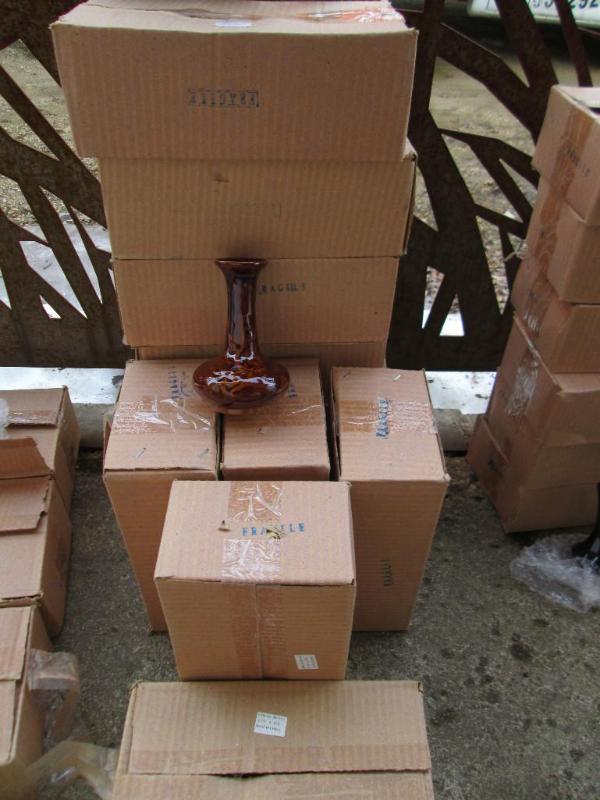 Lot of 44 brown ceramic vases.check...
