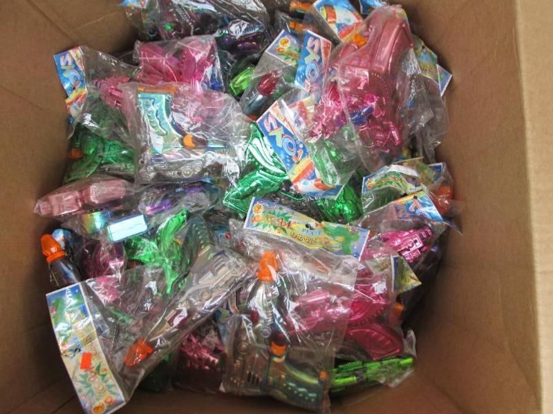 Box of assorted toy guns...