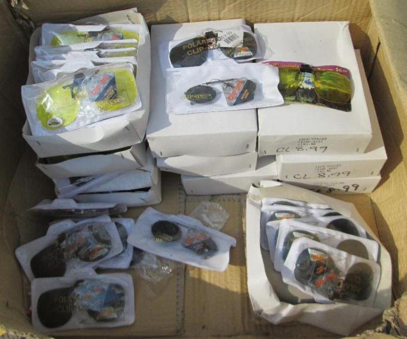 Lot of 11 boxes of assorted clip on...