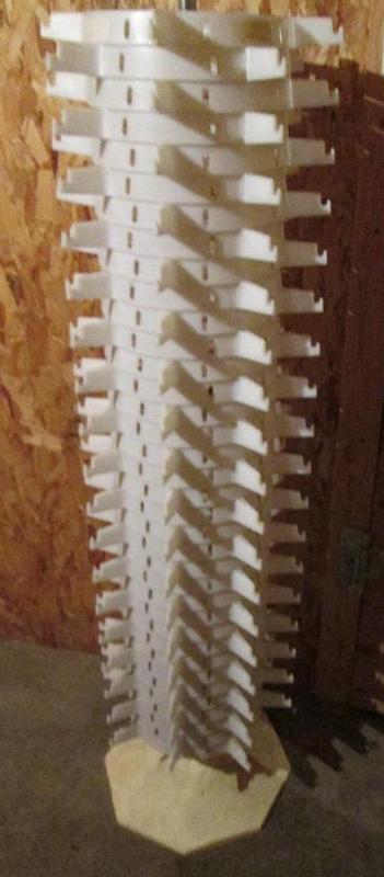 White plastic sunglasses spinner...