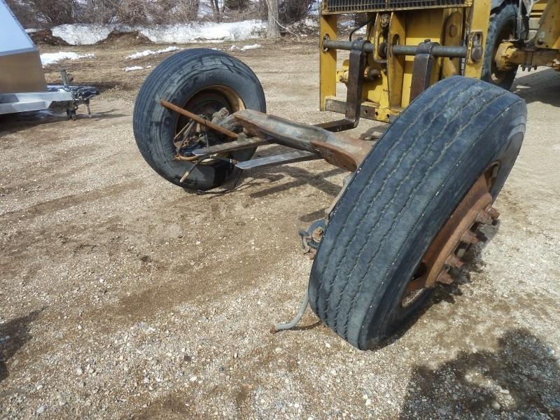 lot 39 image: Front Truck axle Ball and peed rim...