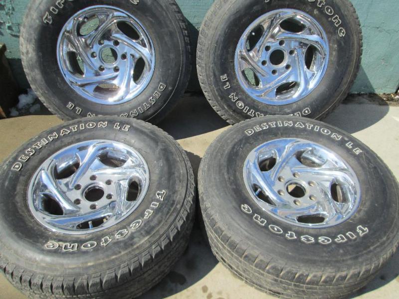 lot 1 image: Set of 4 American Racing rims with ...