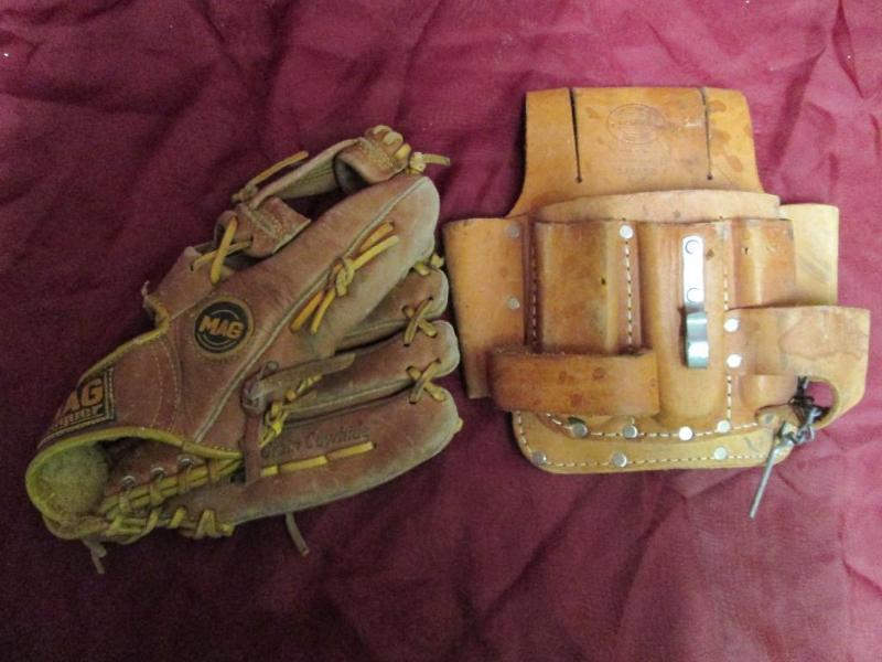 lot 140 image: Ball glove and Nicholas tool pocket...