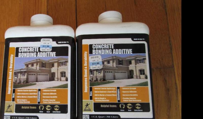 lot 142 image: 2 containers concrete bonding addit...