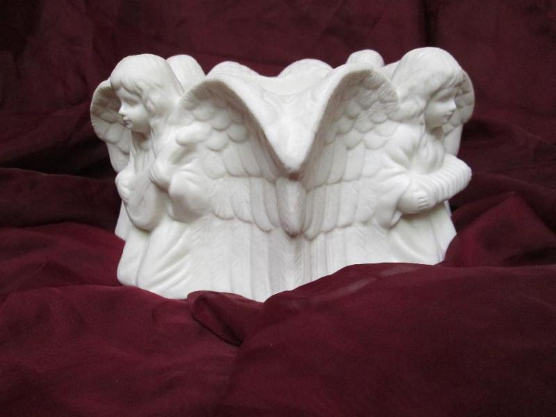 lot 148 image: Bisque porcelain angel candle holde...