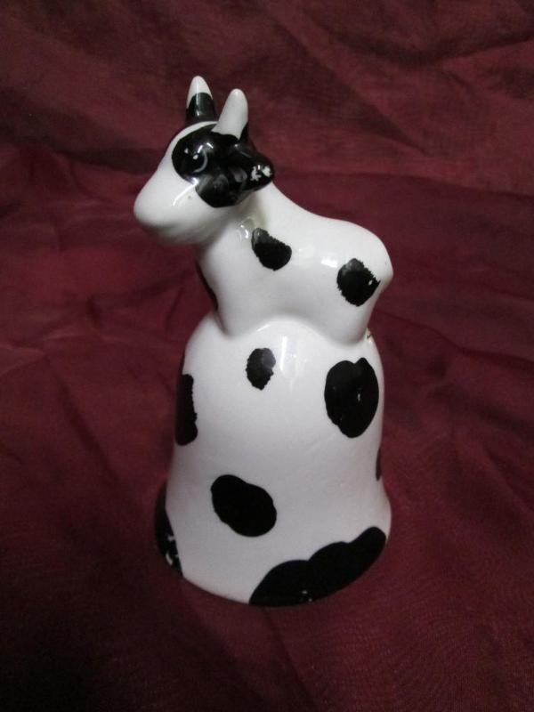 lot 168 image: Cow design bell. Add a little moo t...