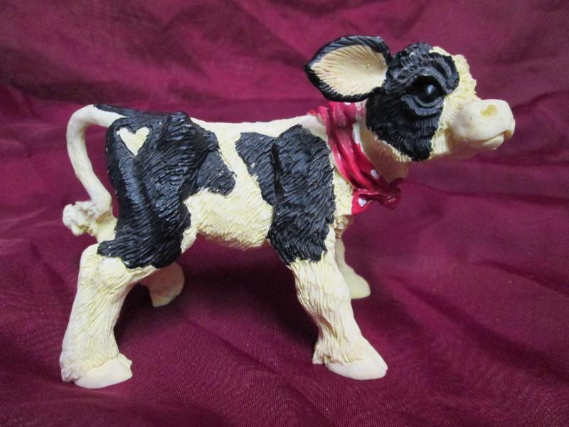 lot 169 image: Resin calf with cute red bandana....