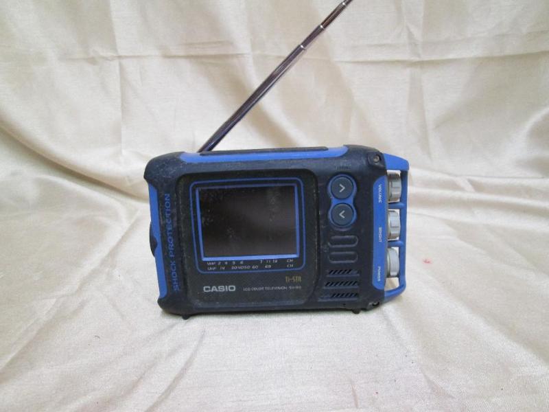 lot 199 image: Casio miniature LCD color televisio...