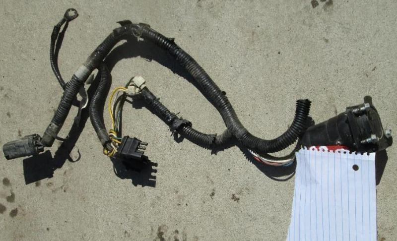 lot 21 image: Trailer wiring with assorted plugs...