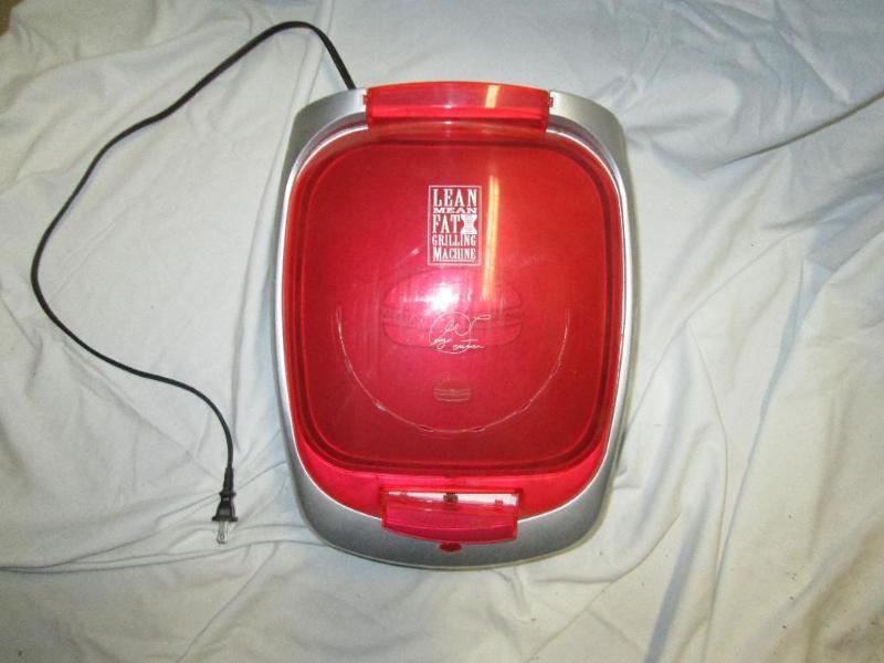 lot 210 image: George Foreman lean mean fat grilli...